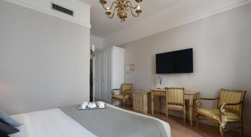 TV a/nebo společenská místnost v ubytování Hotel Cannero