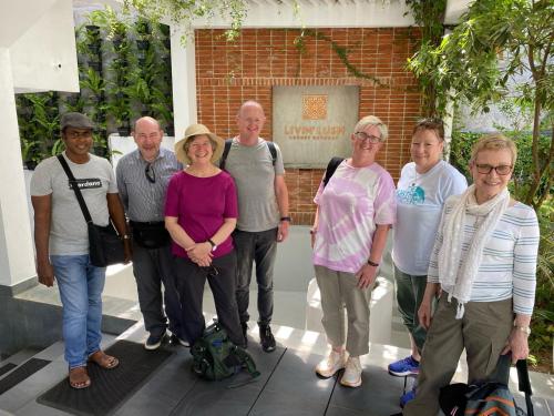 a group of people standing in front of a building at Livin Lush Luxury Retreat in Anuradhapura