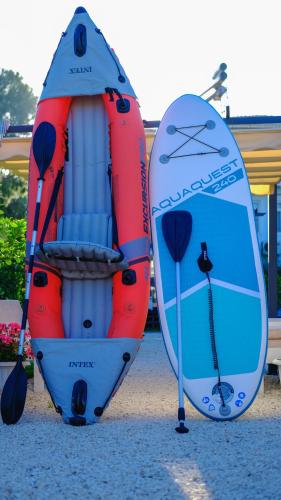 two kayaks sitting next to each other on the beach at Efe Tiny House in Serik