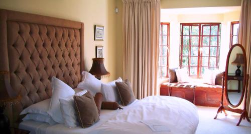 Highgrove House Country Hotel, Restaurant, Farm & Spaにあるベッド