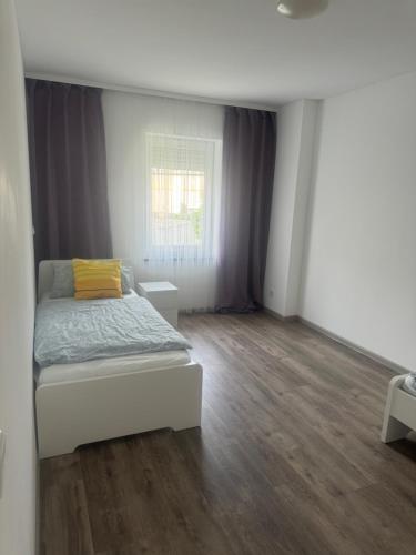 Postel nebo postele na pokoji v ubytování ALEX-Ferienhaus