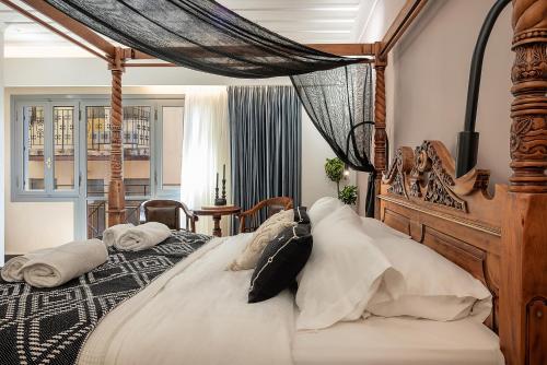 Postel nebo postele na pokoji v ubytování Vranas Ambiance Hotel