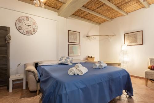 A bed or beds in a room at Raffinata taverna con camino
