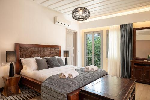 Postel nebo postele na pokoji v ubytování Vranas Ambiance Hotel
