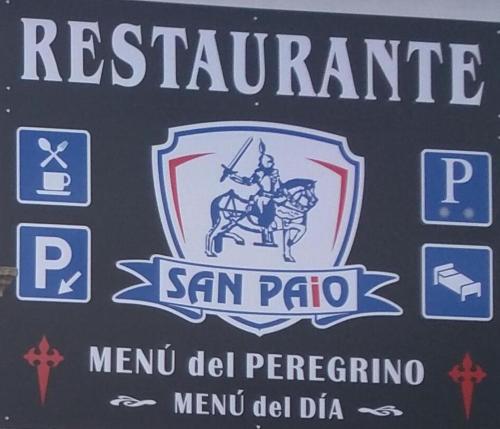a sign for a restaurant with a man riding a horse at Restaurante y Hostal San Paio in Santiago de Compostela