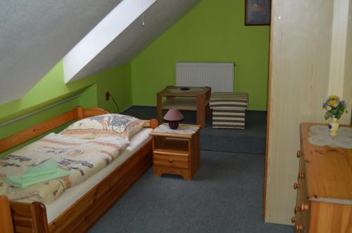 Postel nebo postele na pokoji v ubytování Hotel Paradise