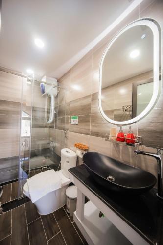 Ванная комната в Cherry Hotel 2 Da Lat