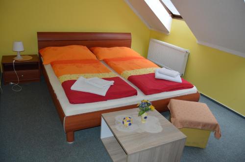 Postel nebo postele na pokoji v ubytování Hotel Paradise
