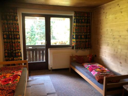 Cama o camas de una habitación en Appartement Grünfelder
