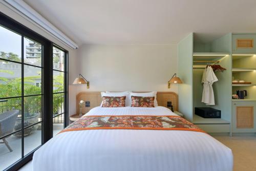En eller flere senge i et værelse på Anantasila Beach Resort Hua Hin