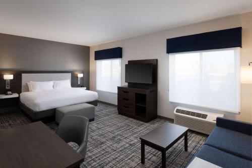 Ένα ή περισσότερα κρεβάτια σε δωμάτιο στο Hampton Inn & Suites Manteca