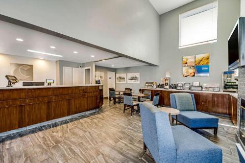 a waiting room at a hospital with chairs and a counter at Comfort Inn Beach Boardwalk in Santa Cruz