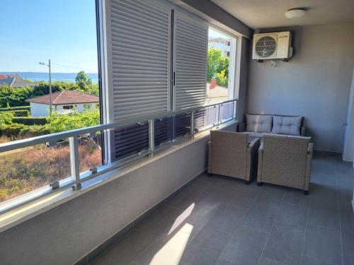 Χώρος καθιστικού στο Apartmani Rita