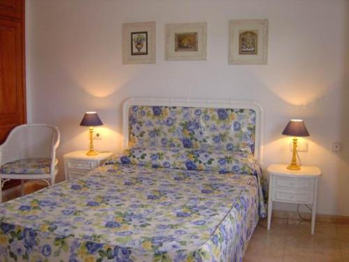 Postel nebo postele na pokoji v ubytování Villas Don Rafael