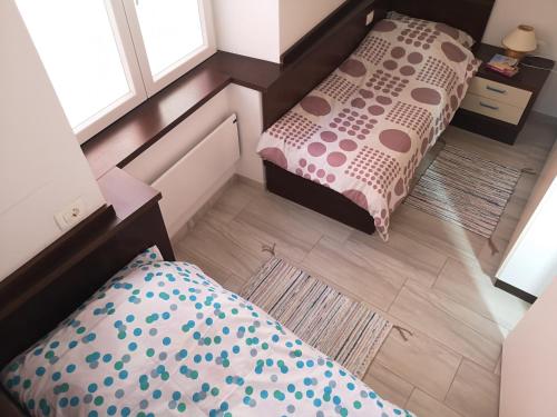 Postel nebo postele na pokoji v ubytování Apartments ZabAba
