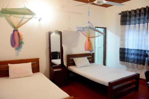 A bed or beds in a room at Grand Royal Villa