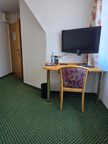 Televisyen dan/atau pusat hiburan di Hotel Landgasthof Blume