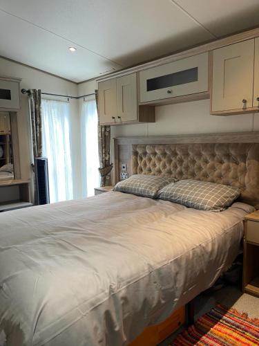 a bedroom with a large bed in a room at Shangri la at Beauport in Westfield
