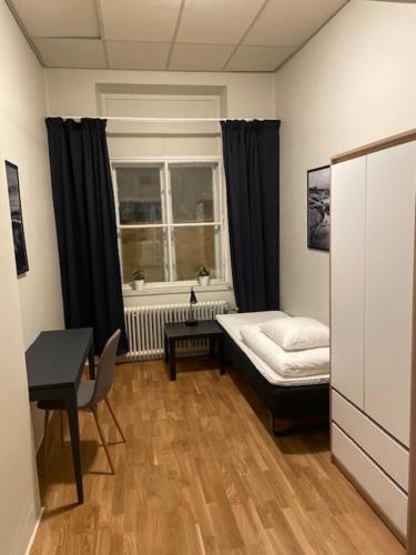 Postel nebo postele na pokoji v ubytování HK Vandrarhem & Longstay
