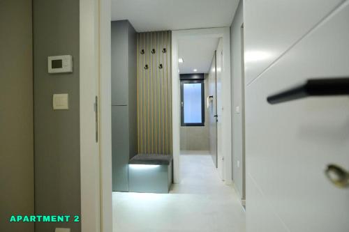 a hallway with a bench in a building at Residence 14 Sarajevo in Sarajevo
