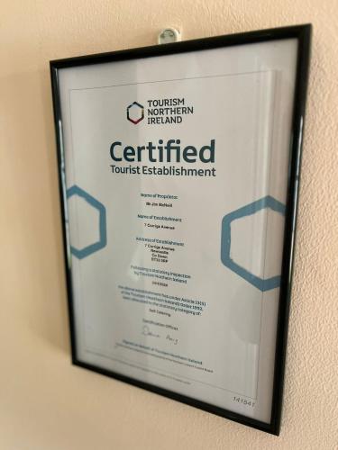 a framed certificate hanging on a wall at Corrigs Retreat in Newcastle
