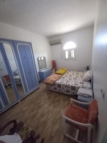 Ένα ή περισσότερα κρεβάτια σε δωμάτιο στο Nubian Egyption House