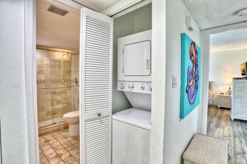 a bathroom with a toilet and a sink at Land's End 4-406 Bay Front in St Pete Beach