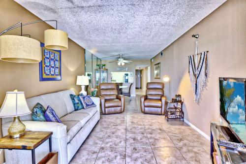 a living room with a couch and chairs at Villa Madeira 506 - Premier in St Pete Beach