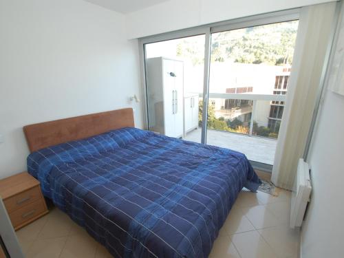 เตียงในห้องที่ Appartement Menton, 2 pièces, 4 personnes - FR-1-196-239