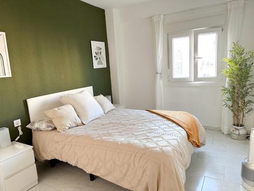 Een bed of bedden in een kamer bij Habitación De Matrimonio