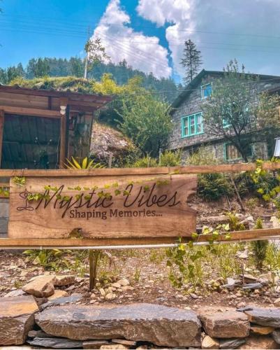 a sign that reads myrtle trees at Mystic Vibes - Jibhi in Jibhi