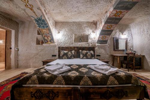 Un ou plusieurs lits dans un hébergement de l'établissement Capp Royal Cave HOTEL