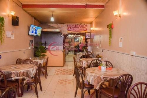 A restaurant or other place to eat at Heritage Villa Hotel & Accomodation