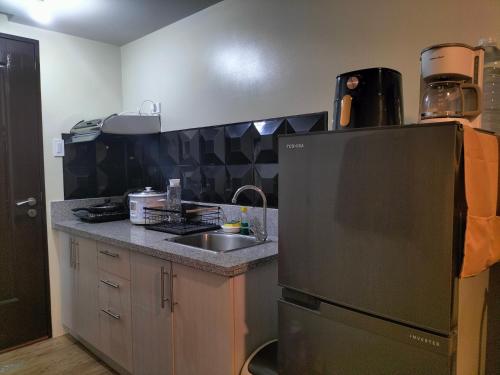 Kuchyň nebo kuchyňský kout v ubytování STANFORD SUITES 3