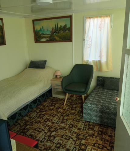 Säng eller sängar i ett rum på Zsófia Vendégház