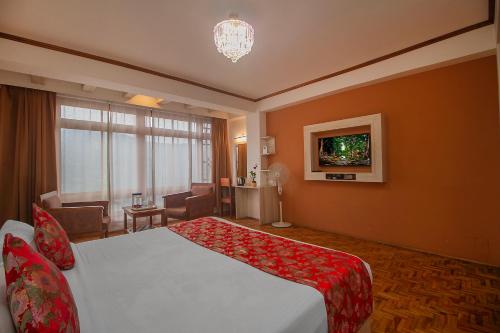 Кровать или кровати в номере Palri Boutique Hotel