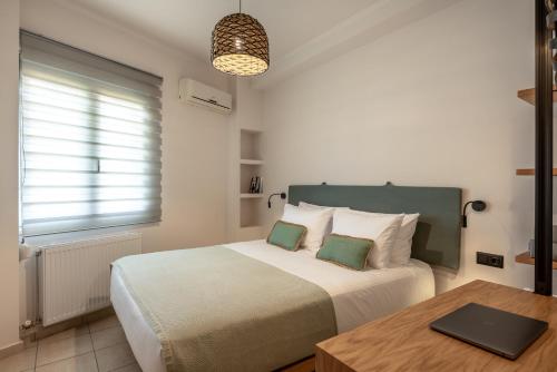 Ένα ή περισσότερα κρεβάτια σε δωμάτιο στο Soleado Studio