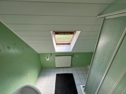 Ένα μπάνιο στο Ferienwohnung Weitblick