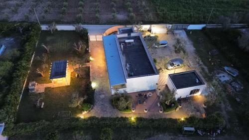 an aerial view of a building with a parking lot at Il Monile in Otranto