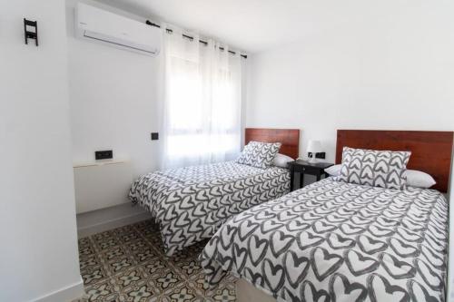 Ένα ή περισσότερα κρεβάτια σε δωμάτιο στο Agradable casa de campo