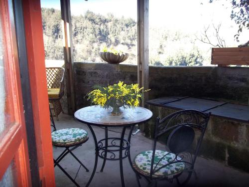 Un balcón o terraza en Casa Sulla Rupe