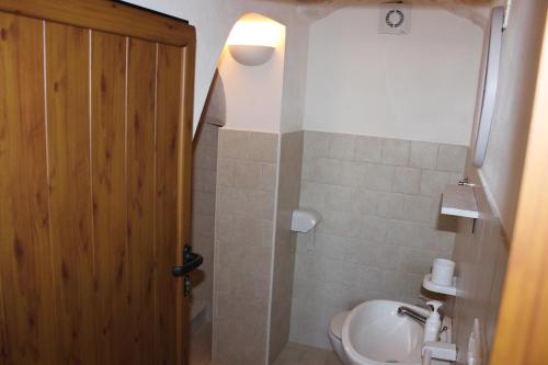 Koupelna v ubytování Il Trullo e la Pietra
