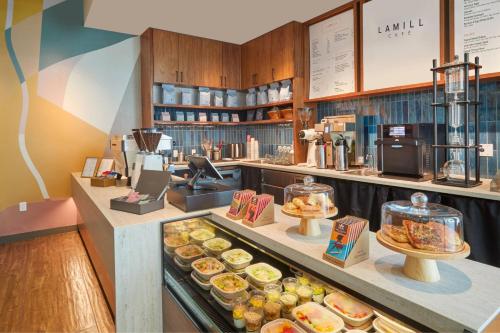 a bakery with many different types of food on display at Renaissance Honolulu Hotel & Spa in Honolulu