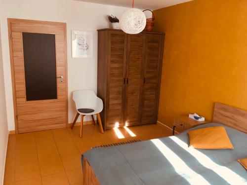Postel nebo postele na pokoji v ubytování Apartmán Corvin