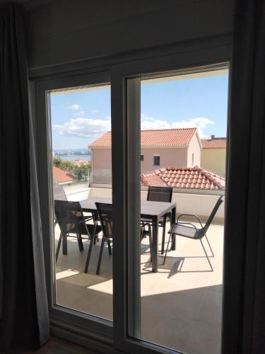 Modern Two Bedroom Apartment with Spacious Seaview Terrace and Free Parking