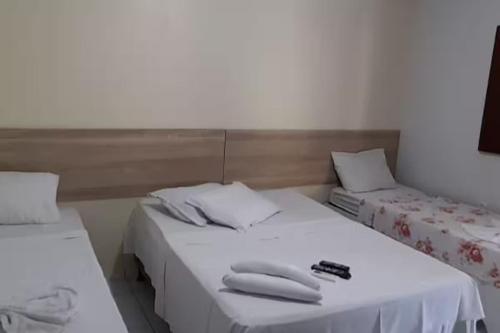 Un pat sau paturi într-o cameră la Mandacaru pousada
