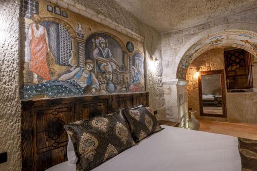 Un ou plusieurs lits dans un hébergement de l'établissement Capp Royal Cave HOTEL