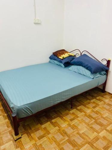 Кровать или кровати в номере NR Guest House