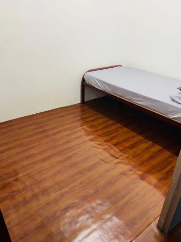 Кровать или кровати в номере NR Guest House