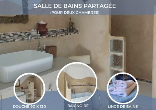a picture of a bathroom with a sink and a mirror at La Bonheurie - Chambres d'hôtes in Moissac